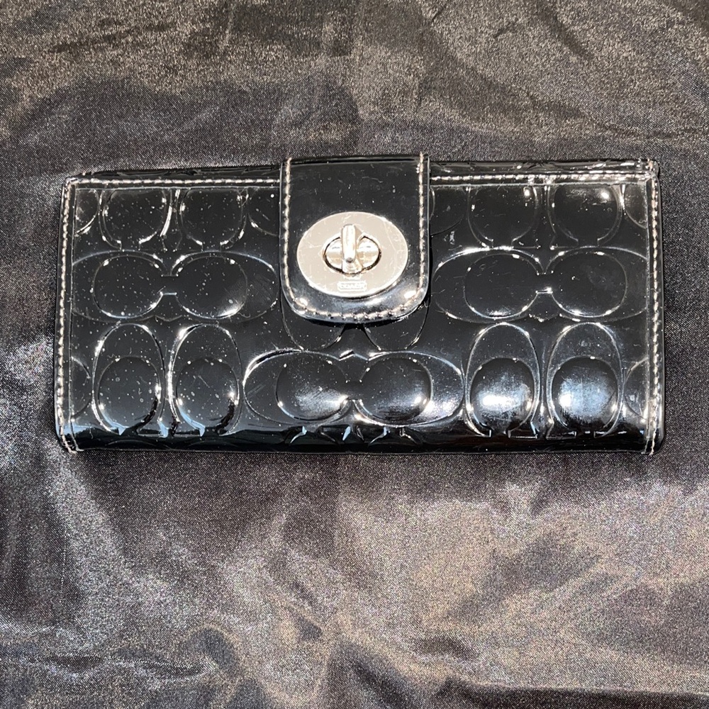COACH Turnlock patent leather wallet